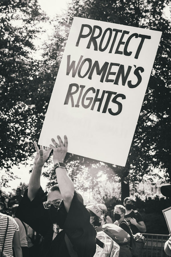 Protester holding Protect Women's Rights sign
