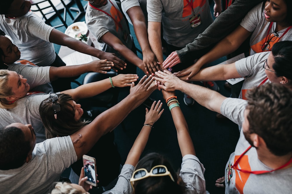 People joining hands in solidarity
